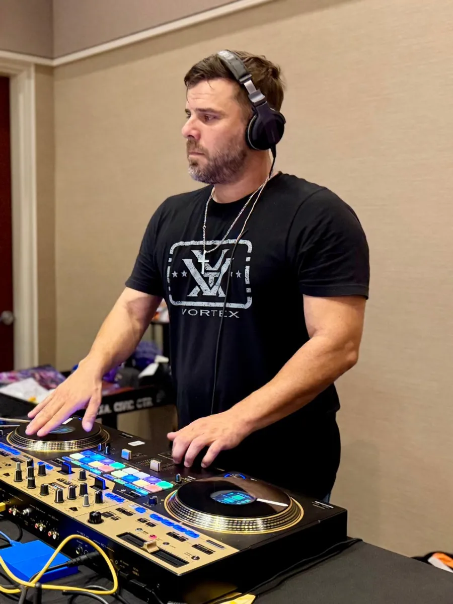 The DJ mixing live at the show